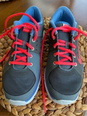 Nike Women’s Gray Athletic Shoes with bright pink Laces and Blue Accents